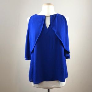 Joseph Ribkoff size 8 royal blue cape top with back button closure. Like new!
